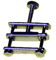 More common closed-sided Hoffman clamp requires that the tubing be disconnected so it can be threaded through the clamp.
