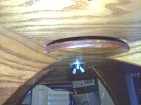 Underside of table showing lazy susan attachment.