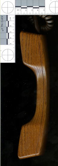 A scan of the Trub handset from the side, with scale.