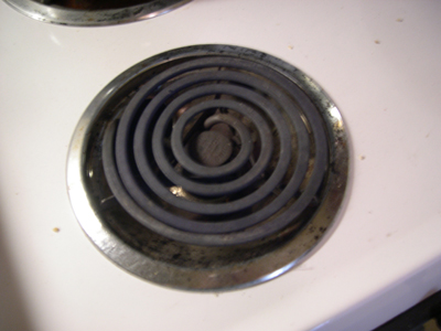 Visible-light digital photograph of stove burner, 2 of 7.